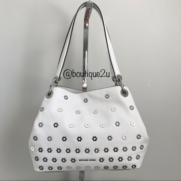 My Account About Us Michael Kors is a world-renowned, award-winning designer of luxury accessories and ready-to-wear. His namesake company, established in , currently produces a range of products under his signature Michael Kors Collection and MICHAEL Michael Kors labels.